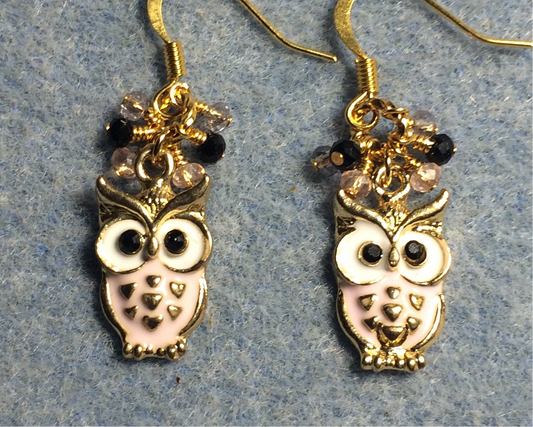 Pink and white enamel owl charm earrings adorned with tiny dangling pink, peach, and black Chinese crystal beads.