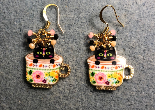 Pink, black, and peach enamel cat sitting in a cup charm earrings adorned with tiny dangling pink, black, and peach Chinese crystal beads.