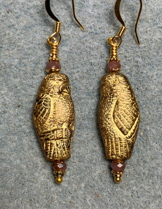 Large violet (with gold wash) Czech glass parrot bead earrings adorned with violet Chinese crystal beads.