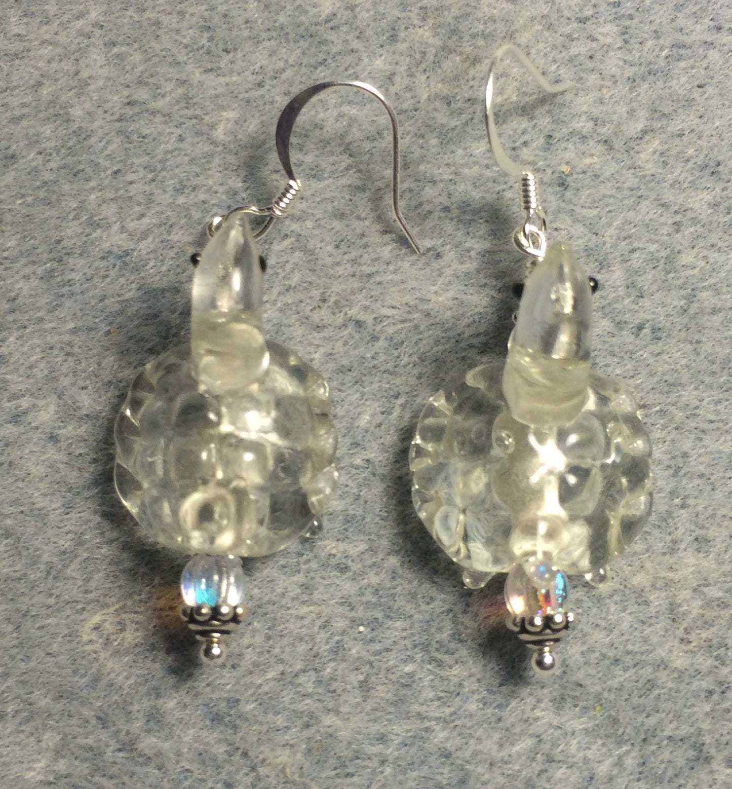 Vintage translucent clear lamp work turtle bead earrings adorned with clear Czech glass beads.