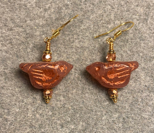 Orange (with copper wash) Czech glass bird bead earrings adorned with gold Chinese crystal beads.