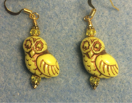Yellow (with gold wash) fancy Czech glass owl bead earrings adorned with yellow Chinese crystal beads.