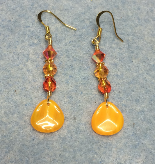 Tangerine Czech glass rose petal earrings adorned with tangerine and orange Czech glass beads.