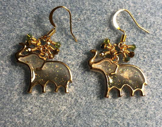 Green and gold resin elephant charm earrings adorned with tiny dangling green and gold Chinese crystal beads.