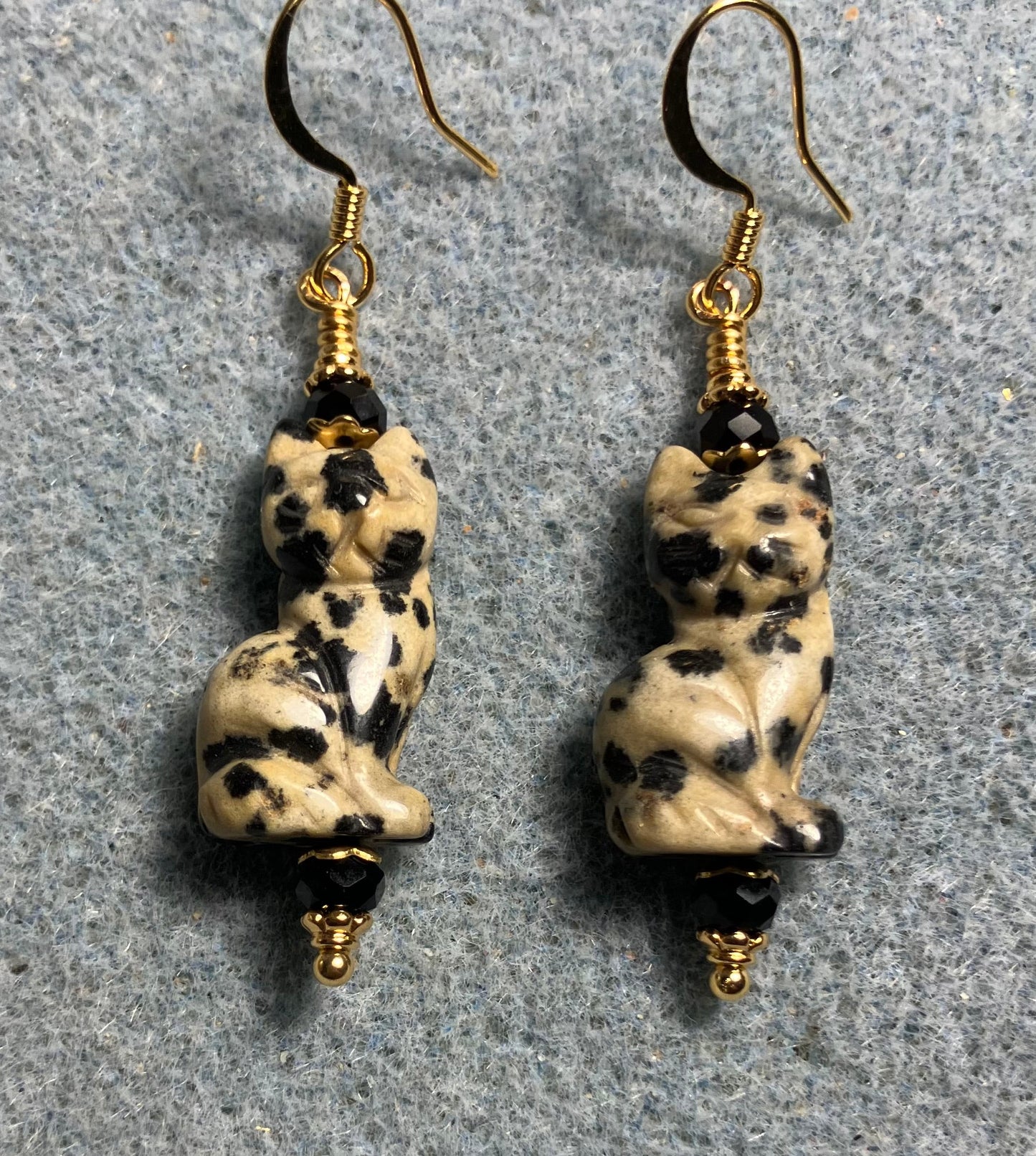 Dalmatian jasper gemstone cat bead earrings adorned with black Chinese crystal beads.