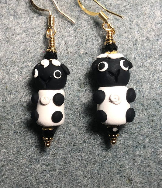 Black and white polymer clay sheep bead earrings adorned with black Chinese crystal beads.
