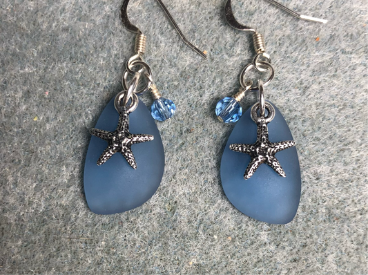 Small light blue sea glass pendant bead earrings adorned with small silver starfish charms and light light Chinese crystal beads.
