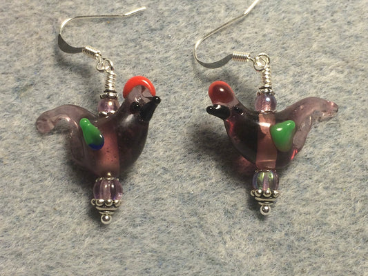 Translucent lavender red crested lamp work songbird bead earrings adorned with lavender Czech glass beads.