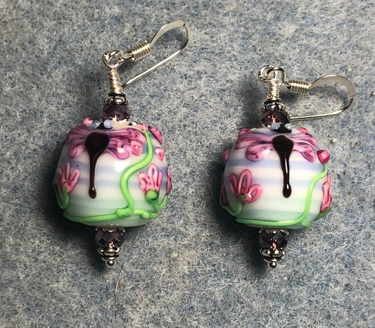 Purple, blue, and green lamp work dragonfly bead earrings adorned with violet Chinese crystal beads.