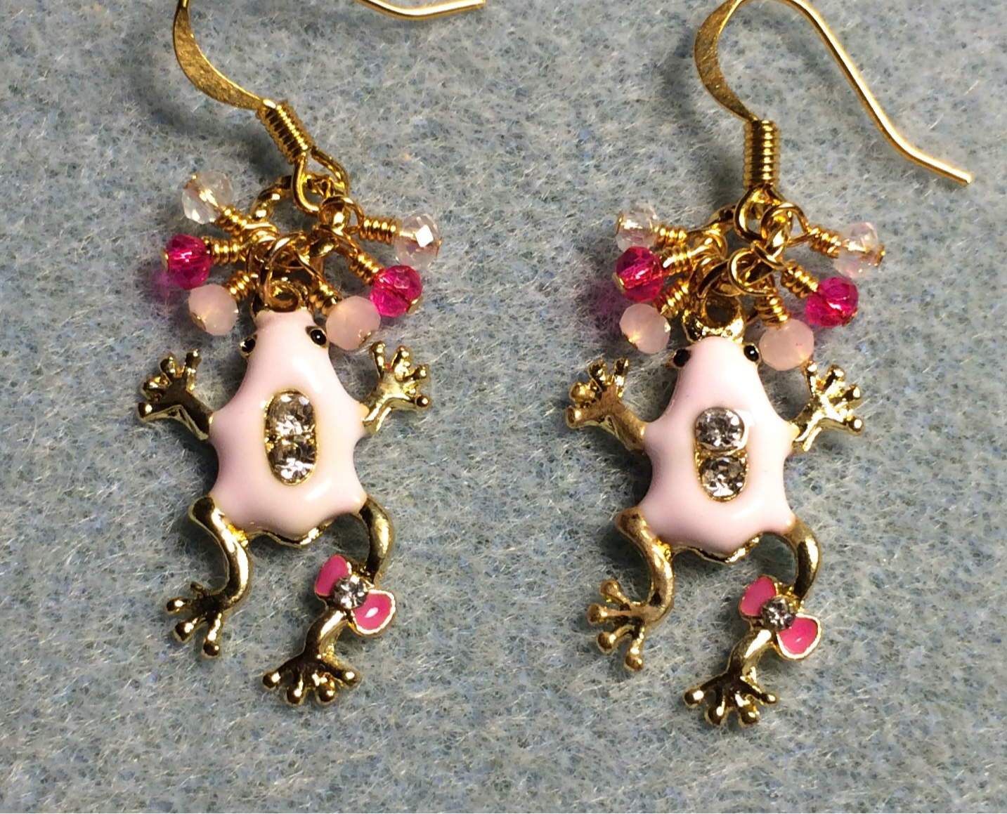 Light pink and hot pink enamel and rhinestone frog charm earrings adorned with tiny dangling light pink and hot pink Chinese crystal beads.