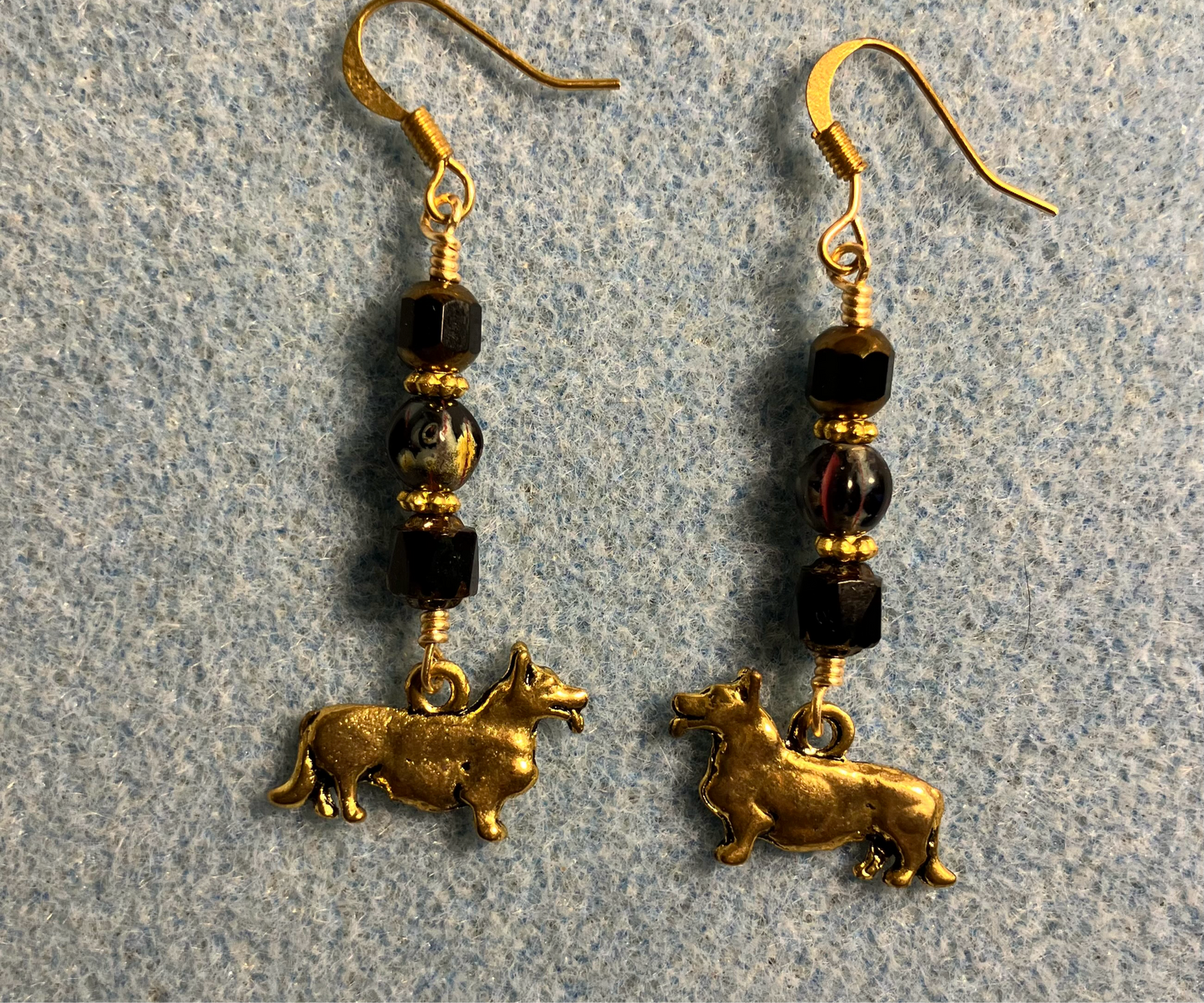 Gold corgi charm earrings adorned with black Czech glass beads