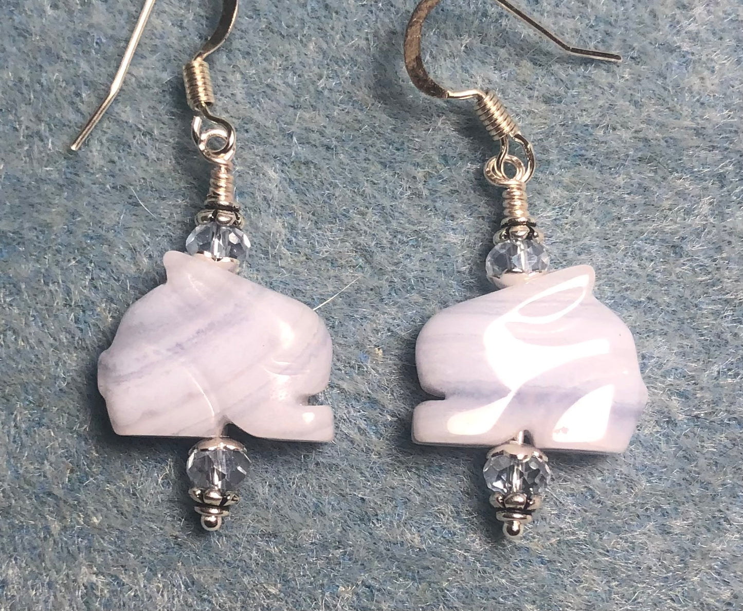 Blue lace agate gemstone rabbit bead earrings adorned with light blue Chinese crystal beads.