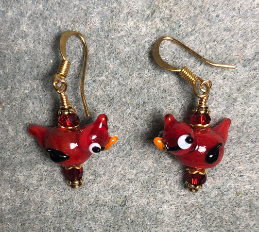 Small red lamp work cardinal bead earrings adorned with dark red Chinese crystal beads.