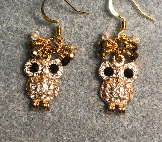 Gold and rhinestone owl charm earrings adorned with tiny dangling gold, black, and clear Chinese crystal beads.