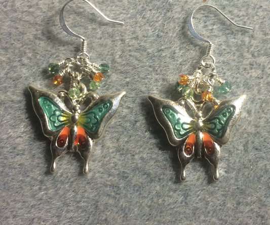Light green, orange, and silver enamel and rhinestone butterfly charm earrings adorned with tiny dangling light green, orange, and clear Chinese crystal beads.