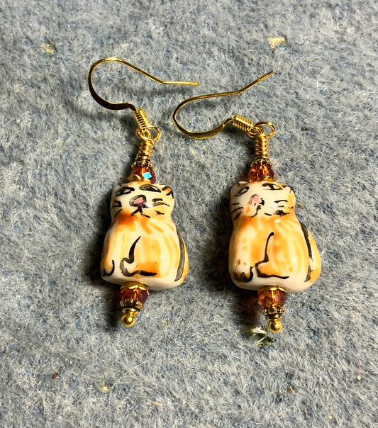 Orange striped ceramic tabby cat bead earrings adorned with orange Chinese crystal beads.