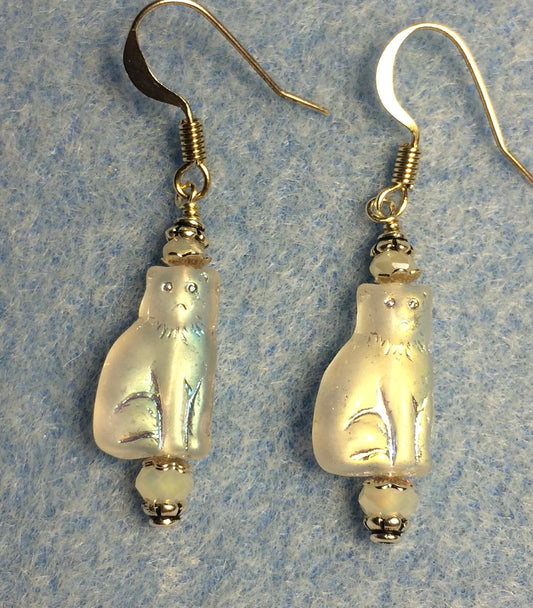 Small metallic white Czech glass cat bead earrings adorned with sparkly white Chinese crystal beads.