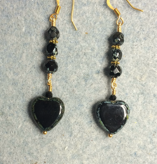 Black Picasso Czech glass heart bead earrings adorned with black Picasso Czech glass beads.