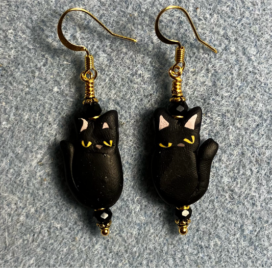 Black polymer clay cat bead earrings adorned with black Chinese crystal beads.