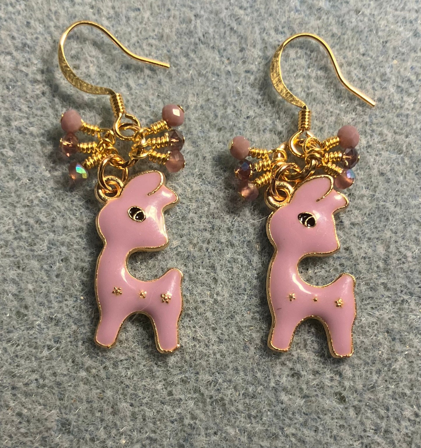 Lavender enamel deer charm earrings adorned with tiny dangling lavender Chinese crystal beads.