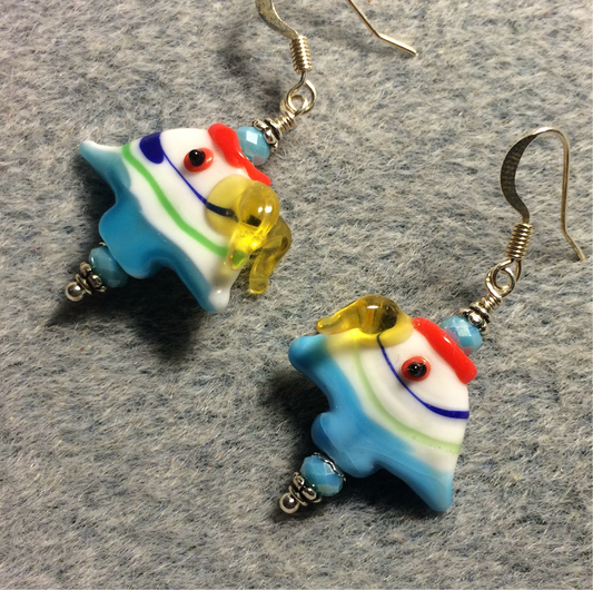 Blue, yellow, and red lamp work angelfish bead earrings adorned with blue Czech glass beads.