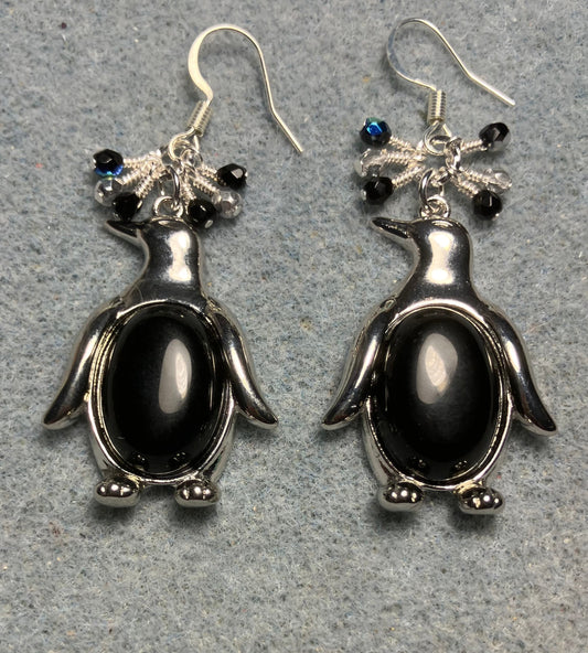Large silver and black onyx gemstone penguin charm earrings adorned with small dangling black and silver Czech glass beads.