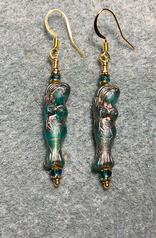 Teal (with copper inlay) Czech glass mermaid bead earrings adorned with teal Chinese crystal beads.