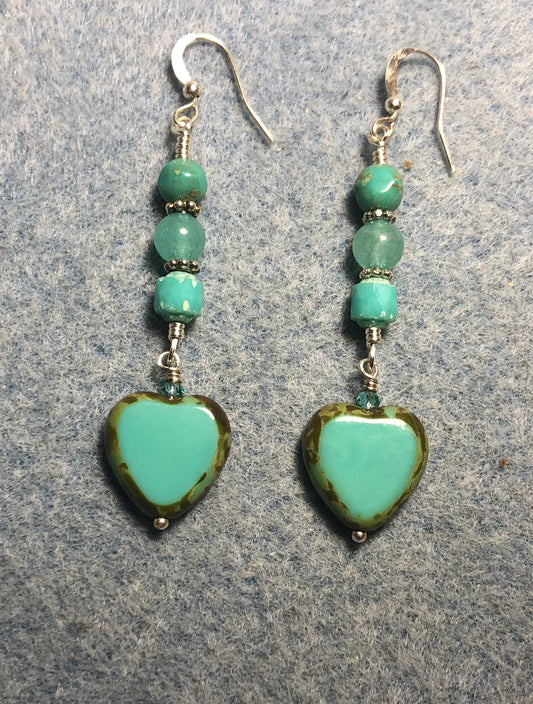 Opaque turquoise Czech glass heart bead earrings adorned with turquoise Czech glass beads.