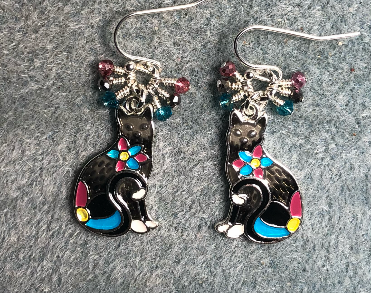 Gray, rose, and turquoise enamel cat charm earrings adorned with small dangling gray, rose, and turquoise Chinese crystal beads.