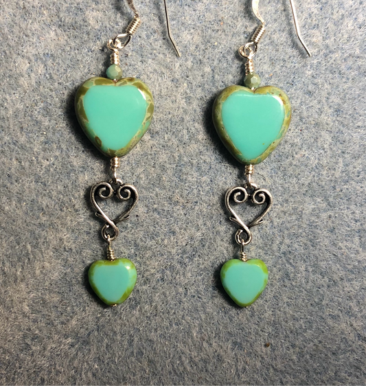 Large and small matching opaque turquoise Czech glass heart bead earrings joined by silver Tierracast heart connectors.