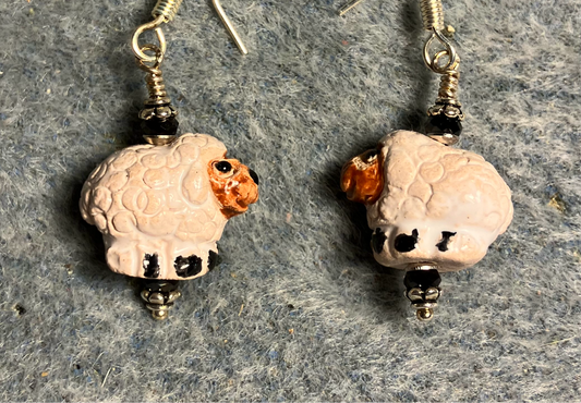 Small white and brown ceramic sheep bead earrings adorned with brown Chinese crystal beads.