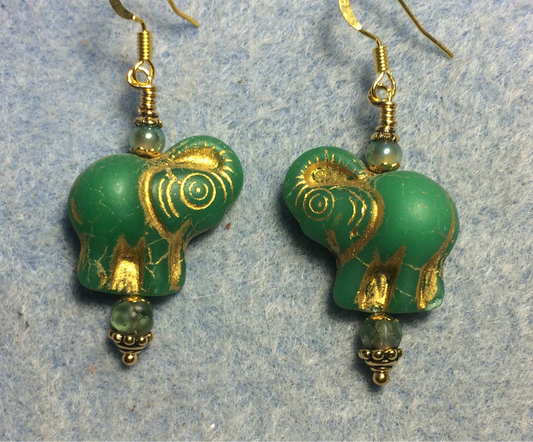 Green (with gold inlay)Czech glass elephant bead earrings adorned with green Czech glass beads.