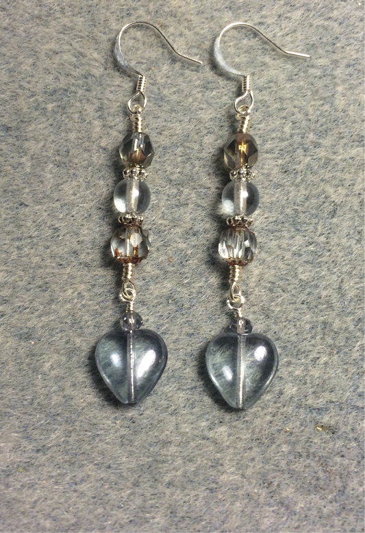 Small light blue Czech glass heart bead earrings adorned with light blue Czech glass beads.