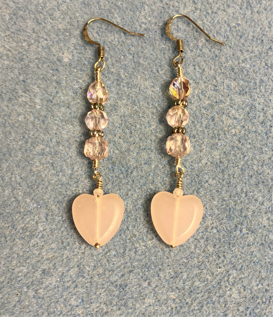 Frosty pink Czech glass heart bead earrings adorned with pink Czech glass beads.