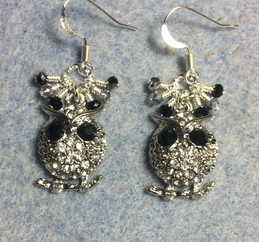 Silver and rhinestone owl charm earrings adorned with tiny dangling black and clear Chinese crystal beads.
