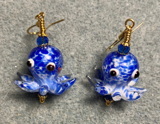 Bright blue and white mottled lamp work octopus bead earrings adorned with bright blue Chinese crystal beads.