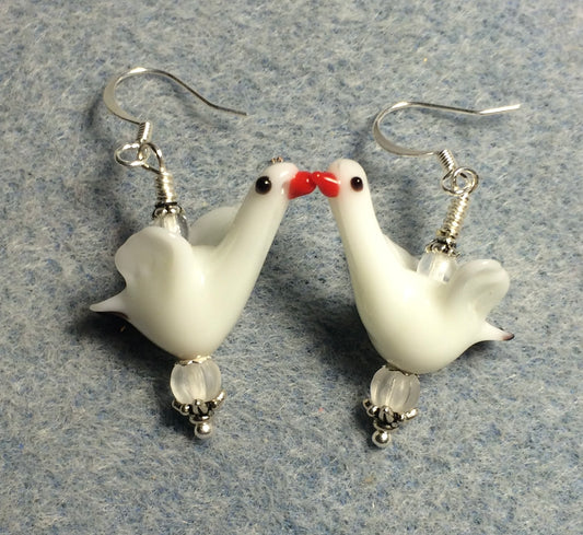 White long necked lamp work swan bead earrings adorned with clear Czech glass beads.