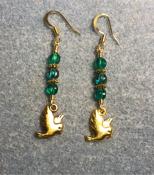 Gold dove charm earrings adorned with small teal Czech glass melon beads