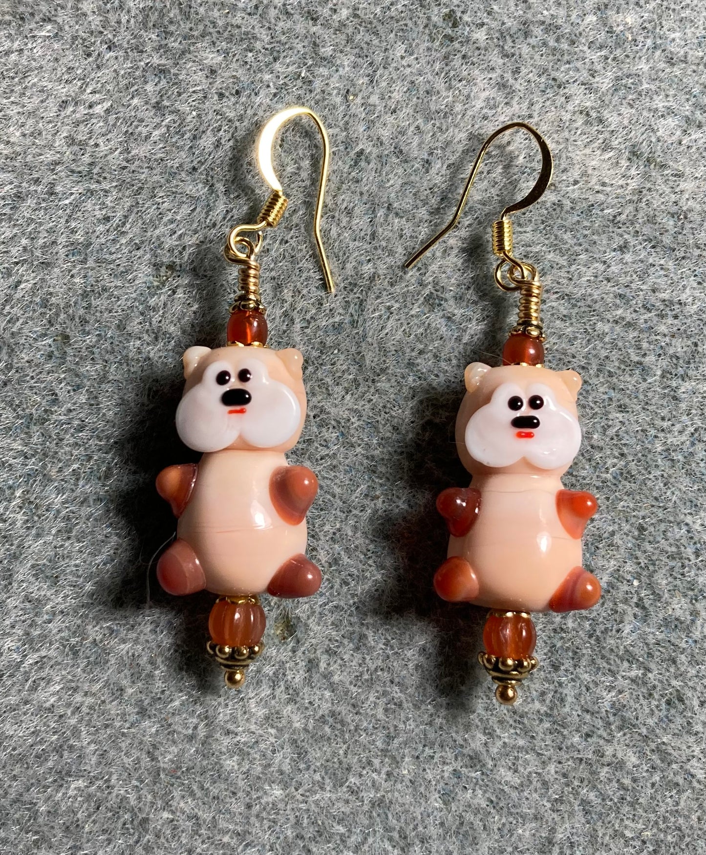 Tan and caramel lamp work teddy bear bead earrings adorned with caramel Czech glass beads.