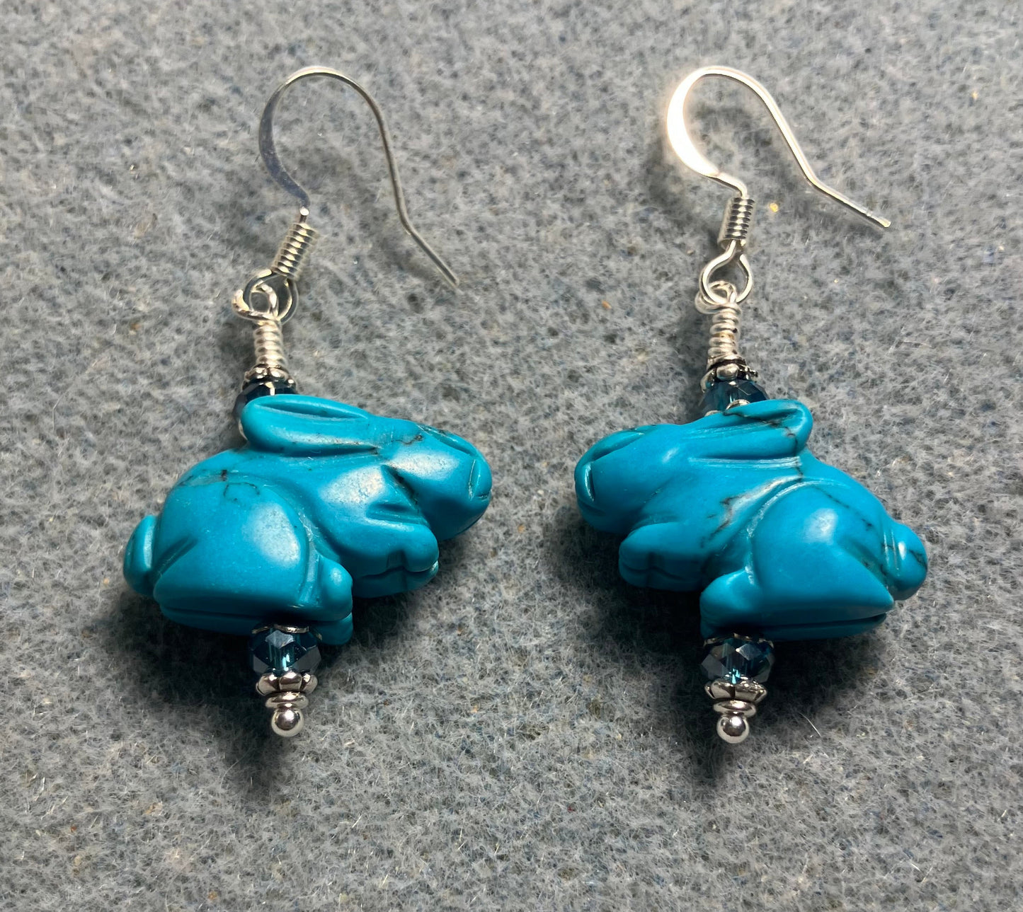 Turquoise howlite gemstone rabbit bead earrings adorned with turquoise Chinese crystal beads.