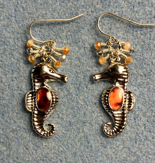 Silver and orange peach abalone seahorse charm earrings adorned with tiny dangling orange, silver, and peach Chinese crystal beads.
