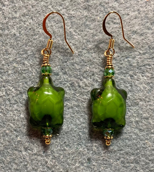 Opaque green Czech glass turtle bead earrings adorned with green Chinese crystal beads.