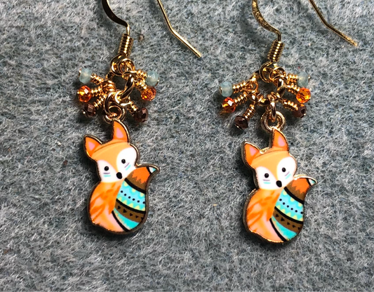 Small orange, turquoise, and brown enamel fox charm earrings adorned with tiny dangling orange, turquoise, and brown Chinese crystal beads.