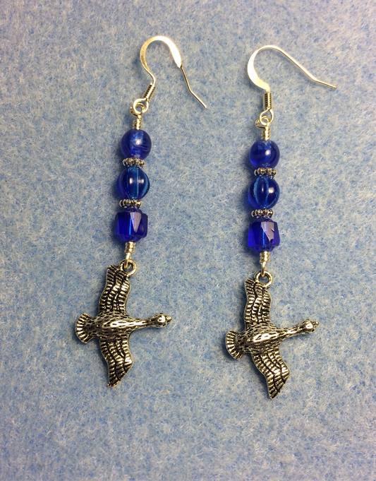 Silver flying geese charm earrings adorned with dark blue Czech glass beads