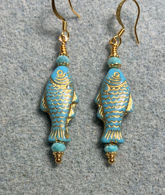 Light turquoise (with gold inlay) Czech glass fish bead earrings adorned with turquoise Chinese crystal beads.