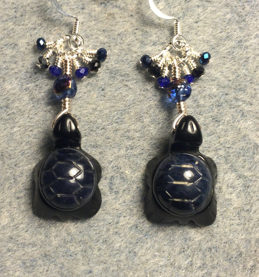 Black onyx and blue sodalite gemstone turtle bead earrings adorned with blue Czech glass beads and tiny dangling blue Chinese crystal beads.