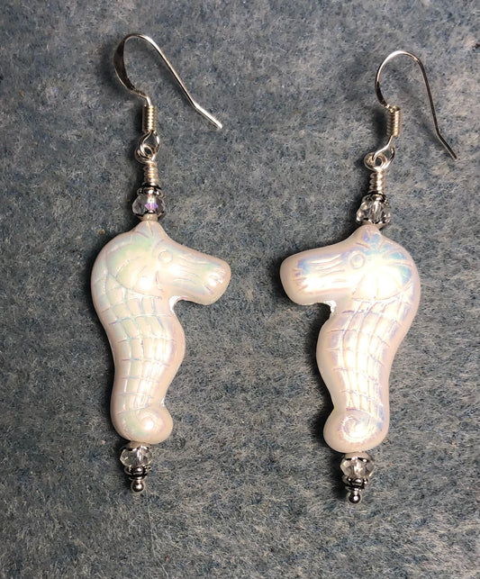Shimmery white Czech glass seahorse bead earrings adorned with clear Chinese crystal beads.