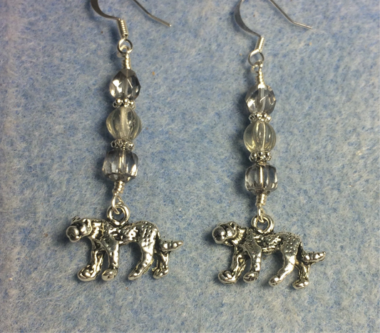 Silver panther charm earrings adorned with silver gray Czech glass beads.