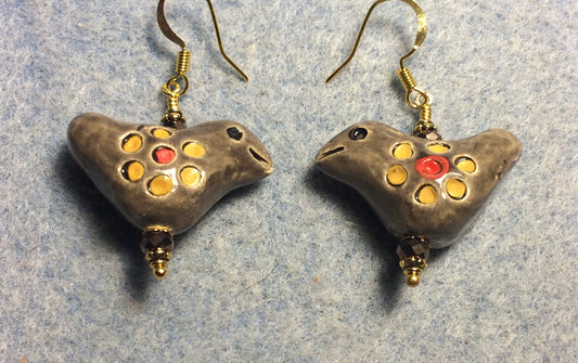 Medium brown, yellow, and red ceramic songbird bead earrings adorned with brown Chinese crystal beads.