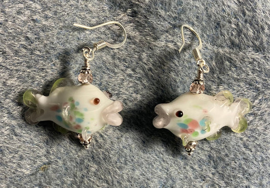 White and pink lamp work fish bead earrings adorned with pink Chinese crystal beads.